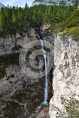 Waterfall in Fanes at Dolomites mountain Stock Photo