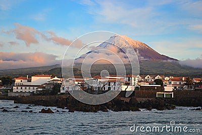 The highest mountain of Portugal, the Azores volcano Montanha do Pico on the island of Pico at sunset Stock Photo