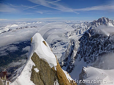 Highest panoramic platform on mountain peak Aiguille du Midi in France above ski village Chamonix Mont-Blanc Stock Photo
