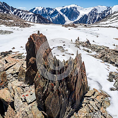 Highland scenery with sharpened stones of unusual shape. Awesome scenic mountain landscape with big cracked pointed stones closeup Stock Photo