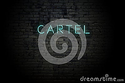 Highlighted brick wall with neon inscription cartel Stock Photo