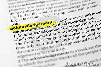 Highlighted English word `acknowledgement` and its definition in the dictionary Stock Photo