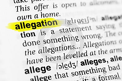 Highlighted English word `allegation` and its definition in the dictionary Stock Photo