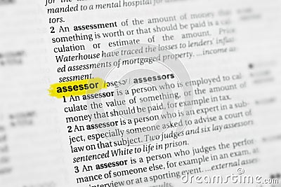 Highlighted English word assessor and its definition at the dictionary Stock Photo