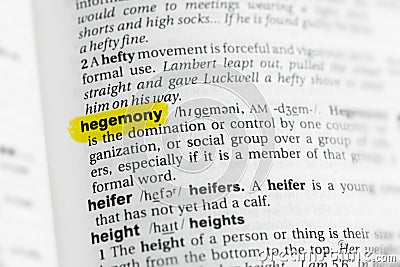 Highlighted English word hegemony and its definition at the dictionary. Stock Photo