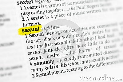 Highlighted English word sexual and its definition at the dictionary. Stock Photo