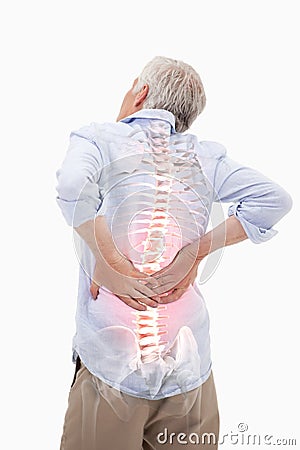 Highlighted spine of man with back pain Stock Photo