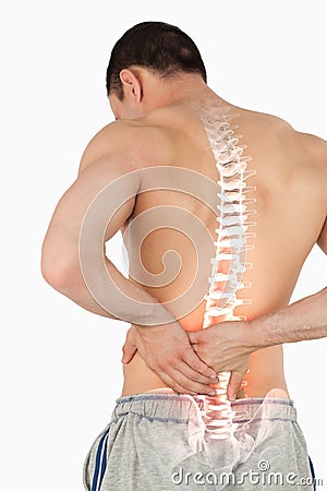 Highlighted spine of man with back pain Stock Photo