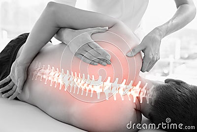 Highlighted spine of man at physiotherapy Stock Photo