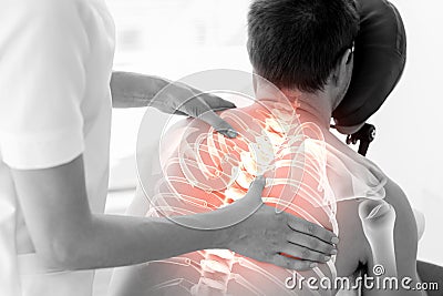 Highlighted spine of man at physiotherapy Stock Photo