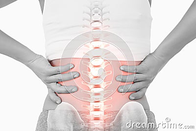 Highlighted spine of woman with back pain Stock Photo