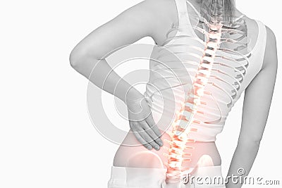 Highlighted spine of woman with back pain Stock Photo