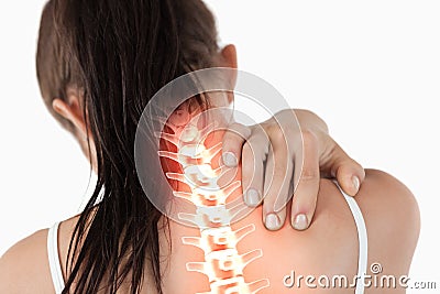 Highlighted spine of woman with neck pain Stock Photo