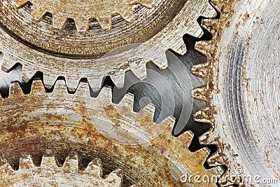 Highly detailed view of metal rusty cogwheels on industrial back Stock Photo