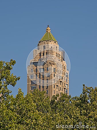 Skyscraper peaking over the trees of Central PArk, New York Editorial Stock Photo