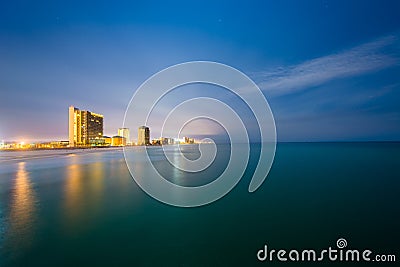 Highrises along the Gulf of Mexico at night, in Panama City Beach, Florida Stock Photo