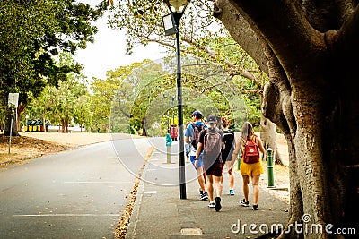 Highschool students were walking in the park Editorial Stock Photo