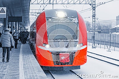 Highspeed train stands at the station platform. Editorial Stock Photo