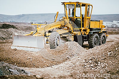 Highway construction site with motor grader, excavator and bulldozer working Stock Photo