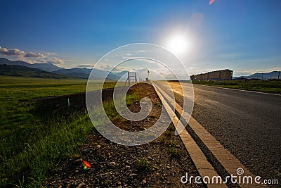 A highway crossing the plateau meadow Stock Photo