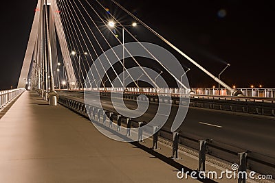 Highway going through a cable-stayed bridge Stock Photo