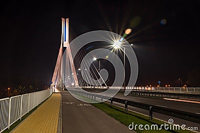 Highway going through a cable-stayed bridge Stock Photo