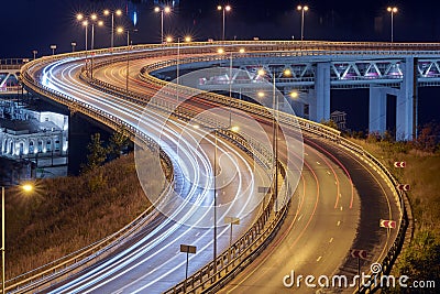 Highway at night lights Stock Photo