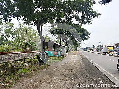 Highway and railroad, Pucuk -Lamongan, east Java. 04-03-2021 Editorial Stock Photo