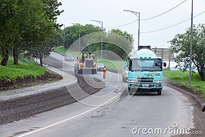 Highway repair and stopping traffic Editorial Stock Photo