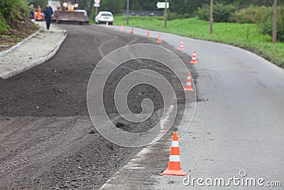 Highway repair and stopping traffic Editorial Stock Photo