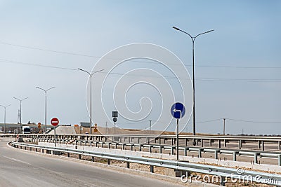 Highway with road signs entry is prohibited and turn left Stock Photo