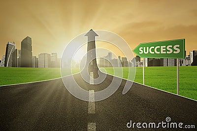 Highway with a success signpost Stock Photo