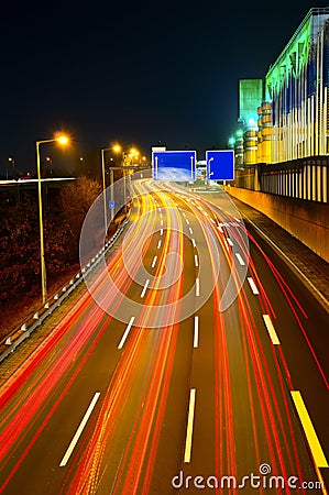 Highway traffic at night Stock Photo