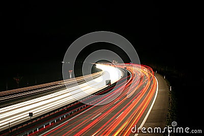 Highway traffic at night Stock Photo