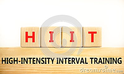 HIIT high-intensity interval training symbol. Concept words HIIT high-intensity interval training on blocks on a beautiful white Stock Photo