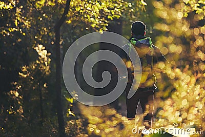 Hiker, backpacking and hiking in nature forest, trekking woods or trees for adventure, relax workout or fitness exercise Stock Photo