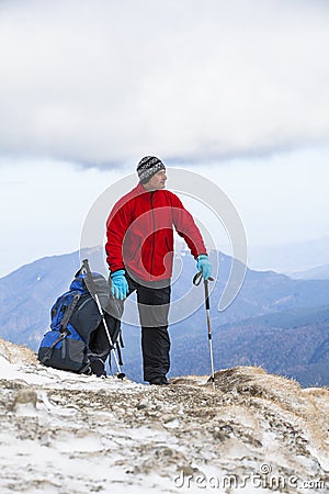 Hiker enjoying beautiful landscape Stock Photo