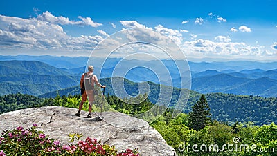 Hiker enjoying beautiful mountain view on Blue Ridge Parkway Stock Photo