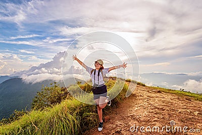 Hiker girl with happy on Phu Chi Fa Mountain Stock Photo