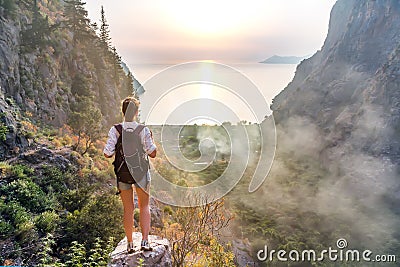Hiker girl on the mountain top Stock Photo