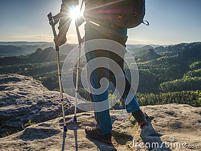 Hiker hold medicine stick, injured knee fixed in knee feature Stock Photo