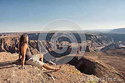 Hiker looks at the Fish River Canyon Stock Photo