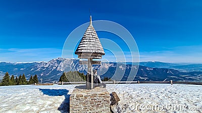 Dreilaendereck - Hiker man at wooden monument at Dreilaendereck, Karawanks, Carinthia, Austria Stock Photo