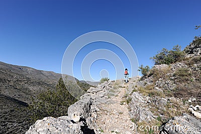 Hiker on Mozarabic trail, Spain Stock Photo