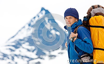 Hiker portrait in winter mountains Stock Photo