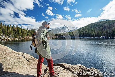 Hiker in Rocky mountains National park in USA Stock Photo