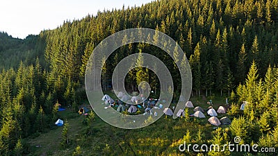 Hiker\'s camp in morning forest in mountains. Top view Stock Photo