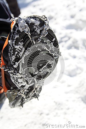 Hiker shoes with anti slip chain Stock Photo