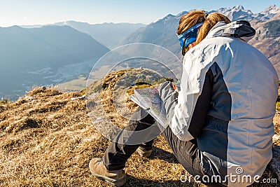 Hiker studying a map. Stock Photo