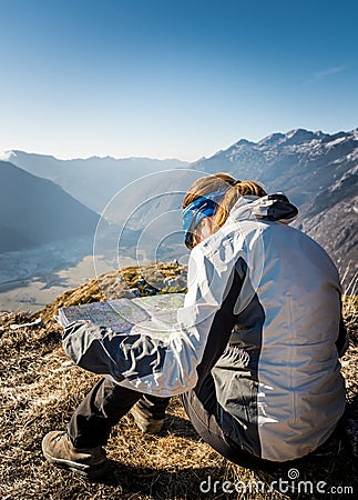 Hiker studying a map. Stock Photo